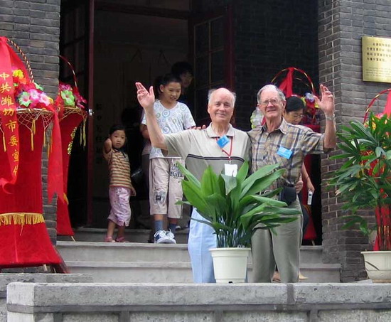 2005 - Dawei Birch & Dawei Beard, standing at the front entrance of Block 61.